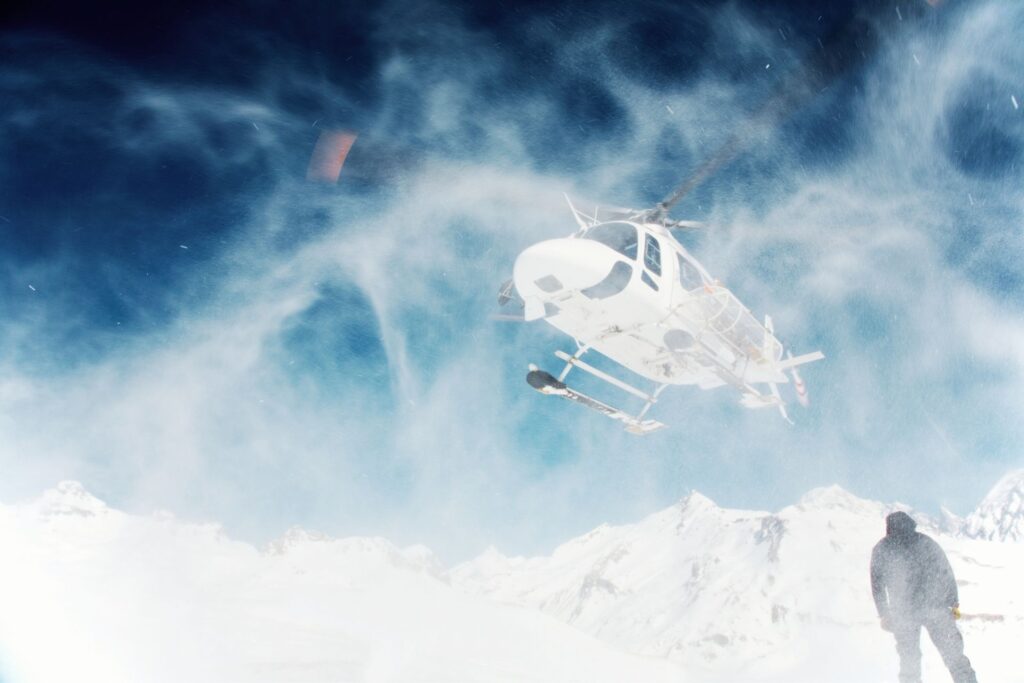 Helicopter lands for heliskiing in Arlberg
